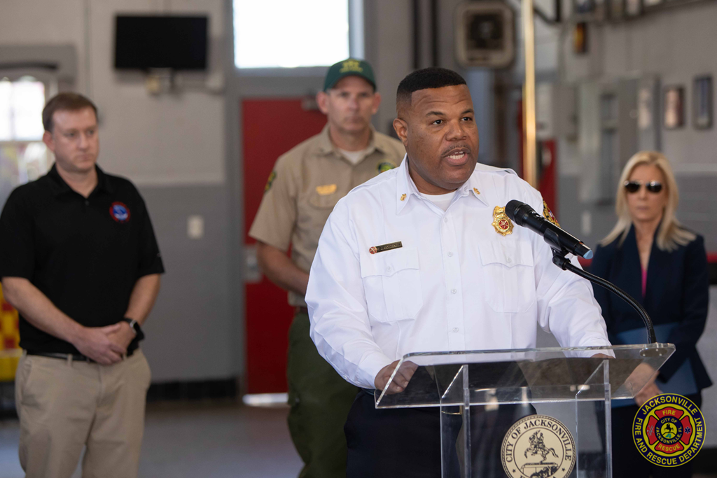 Fire Chief Percy Golden II with Mayor Deegan, Florida Forest Service , and NWS